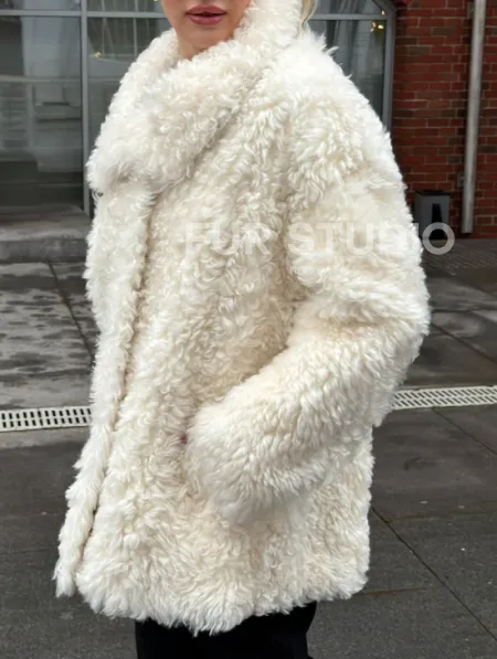 Белая шубка из тиградо - фото 7