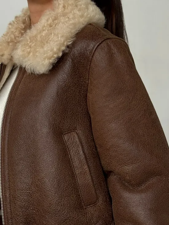 Короткая дубленка - женская - фото 1