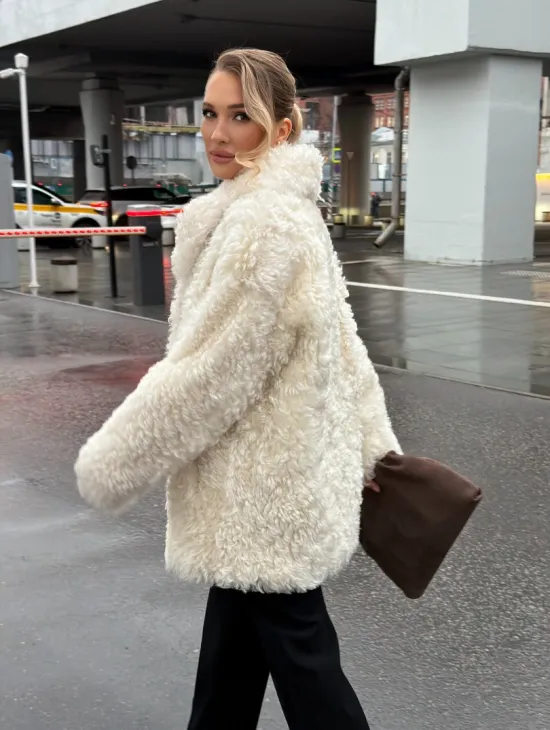 Белая шубка из тиградо - фото 13